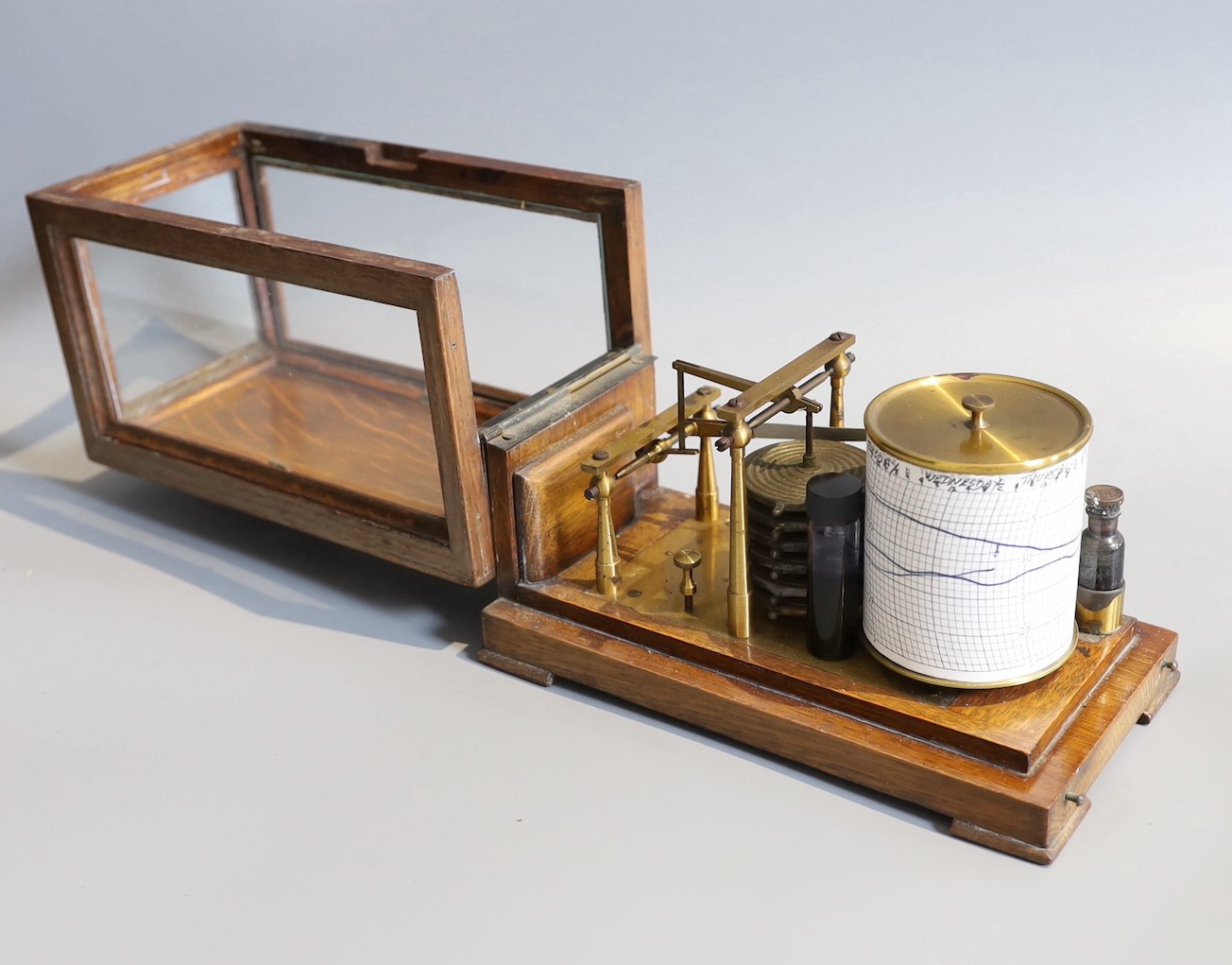 An early 20th century oak cased barograph, by G. Lee & Son, Portsmouth, case 22cm height 13cm